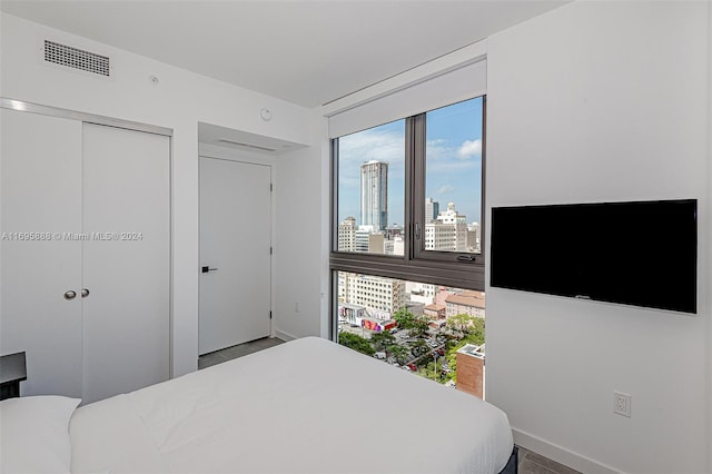 bedroom with multiple windows