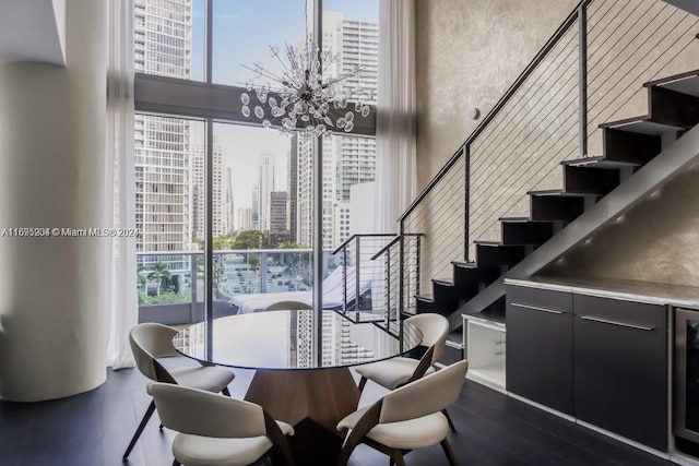 dining area with an inviting chandelier