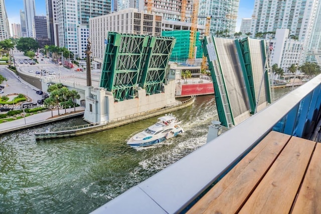 balcony featuring a water view