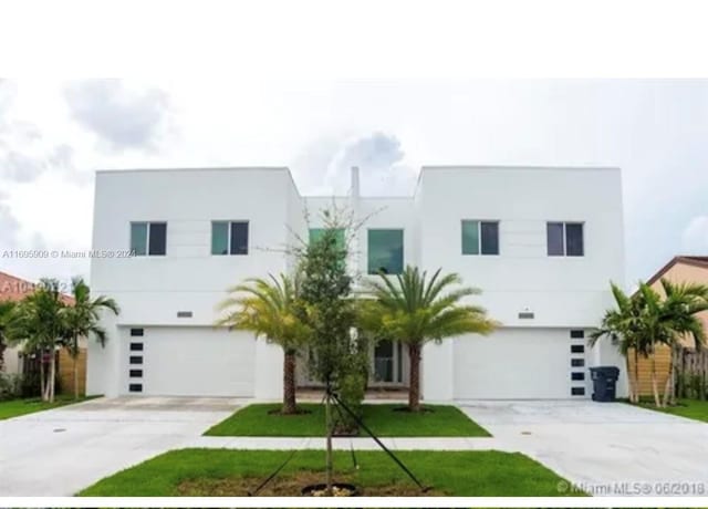 contemporary home featuring a garage