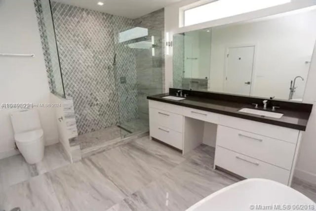 bathroom featuring vanity and walk in shower