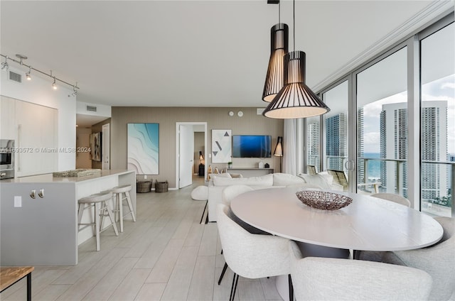 dining space featuring light hardwood / wood-style flooring