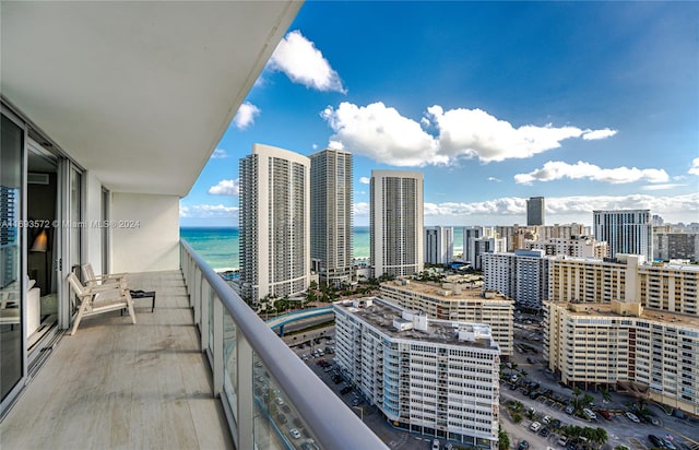 balcony featuring a water view