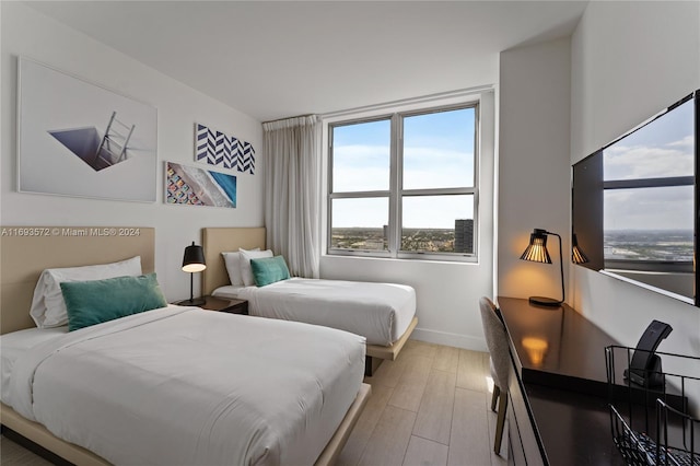 bedroom featuring light hardwood / wood-style floors