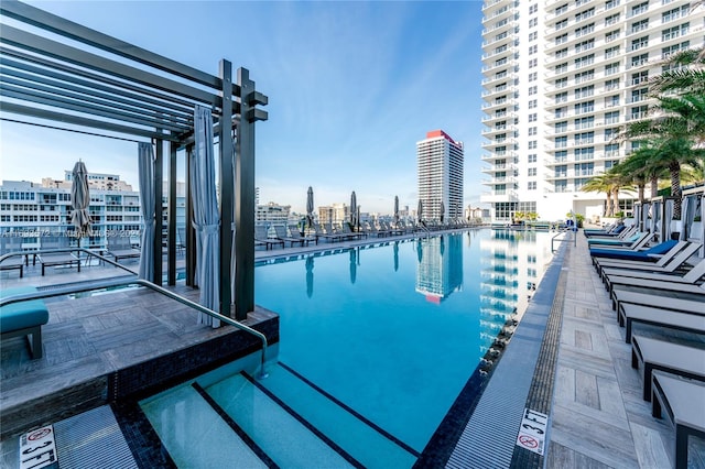 view of pool featuring a pergola