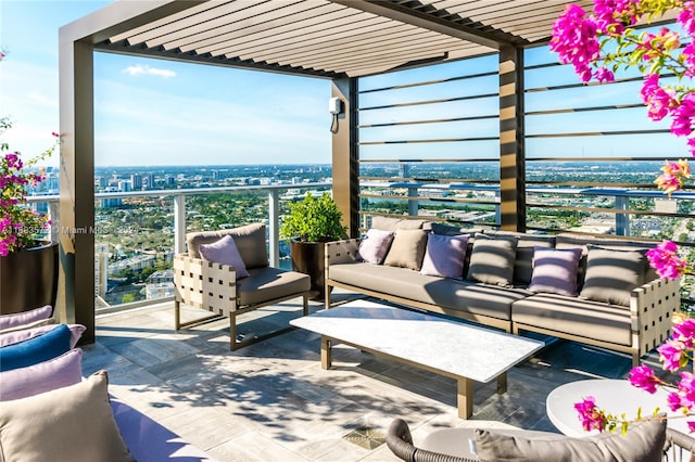 view of patio featuring an outdoor hangout area and a pergola