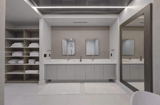 bathroom with vanity and tile patterned floors