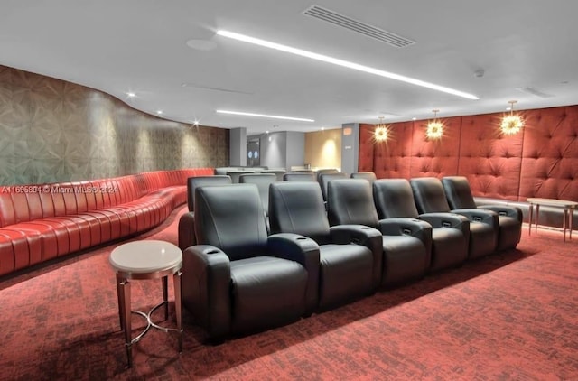 cinema room with dark carpet