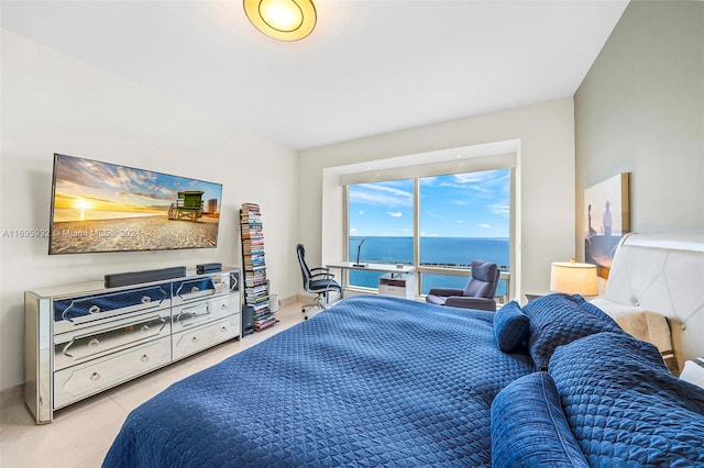 bedroom with light tile patterned floors