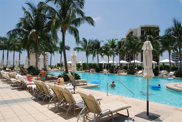 view of swimming pool with a patio area