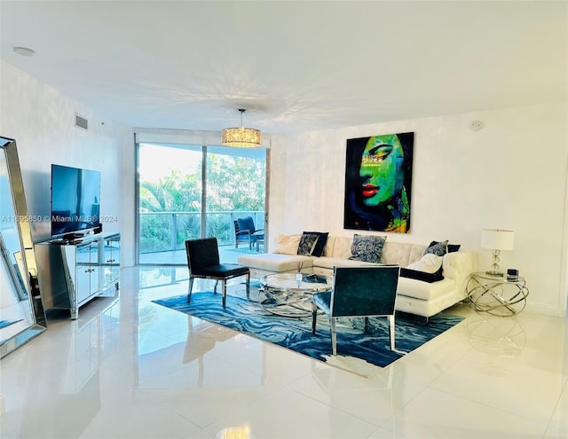 living room with tile patterned flooring