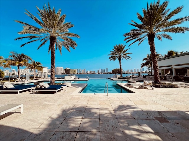 view of swimming pool featuring a patio