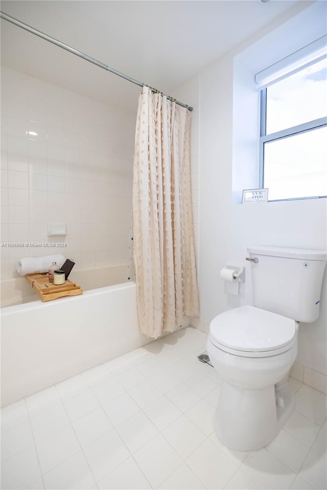 7275 SW 90th St Unit C212, Miami, FL 33156 - full bath featuring tile patterned floors, toilet, and shower / bath combo