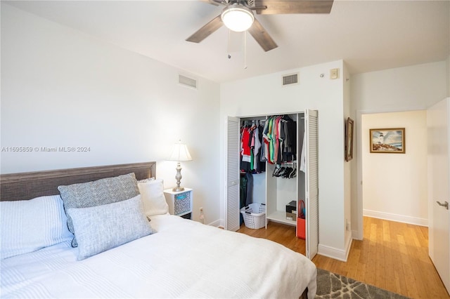 7275 SW 90th St Unit C212, Miami, FL 33156 - bedroom with wood finished floors, a closet, baseboards, and a ceiling fan