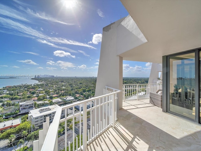 balcony featuring a water view