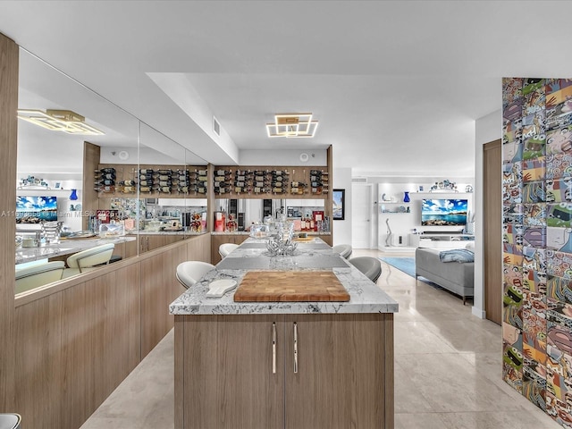 kitchen featuring light tile patterned flooring