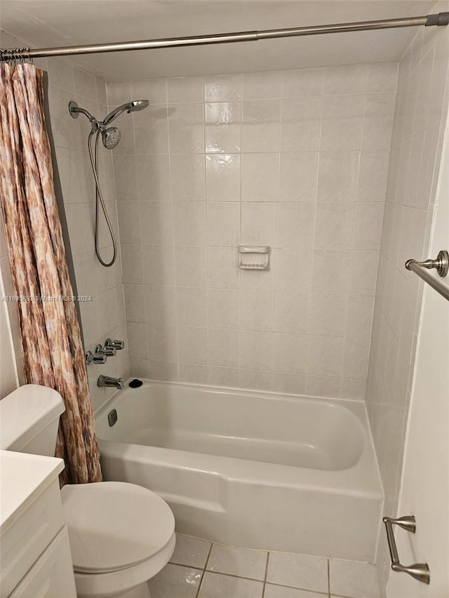 full bathroom with tile patterned floors, vanity, shower / bath combination with curtain, and toilet