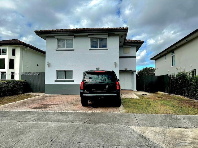 view of front of house with a garage