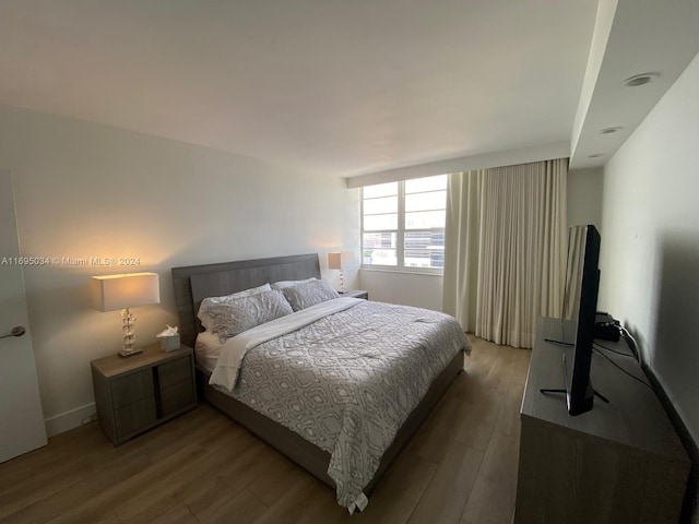 bedroom featuring light wood-type flooring