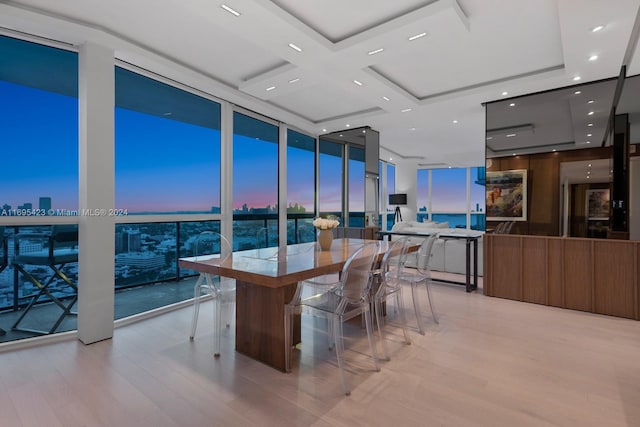 101 20th St Unit 3503/06/09, Miami Beach, FL 33139 - dining space featuring floor to ceiling windows, wood finished floors, coffered ceiling, and healthy amount of natural light