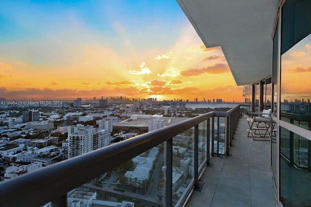 view of balcony at dusk