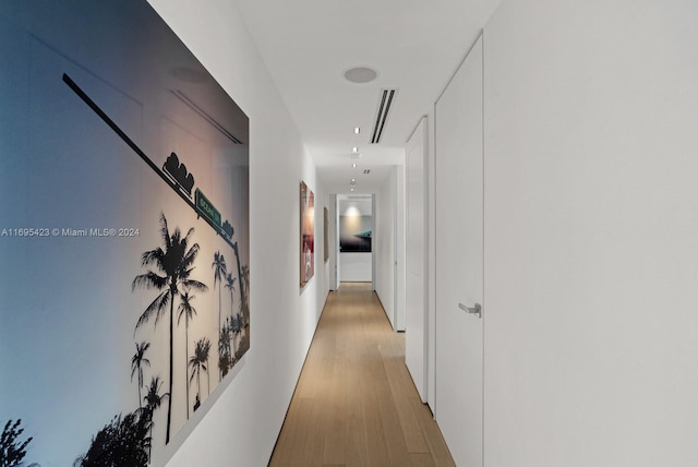 101 20th St Unit 3503/06/09, Miami Beach, FL 33139 - corridor with light wood finished floors and attic access