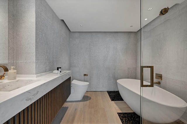101 20th St Unit 3503/06/09, Miami Beach, FL 33139 - full bath featuring hardwood / wood-style flooring, a soaking tub, and vanity
