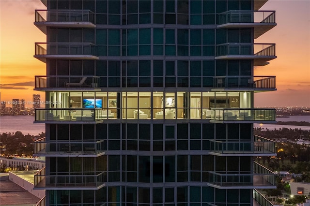 outdoor building at dusk with a water view