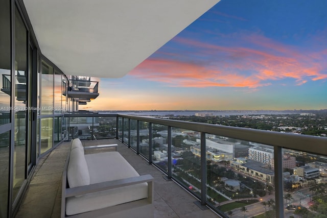 101 20th St Unit 3503/06/09, Miami Beach, FL 33139 - balcony at dusk featuring a city view and a water view
