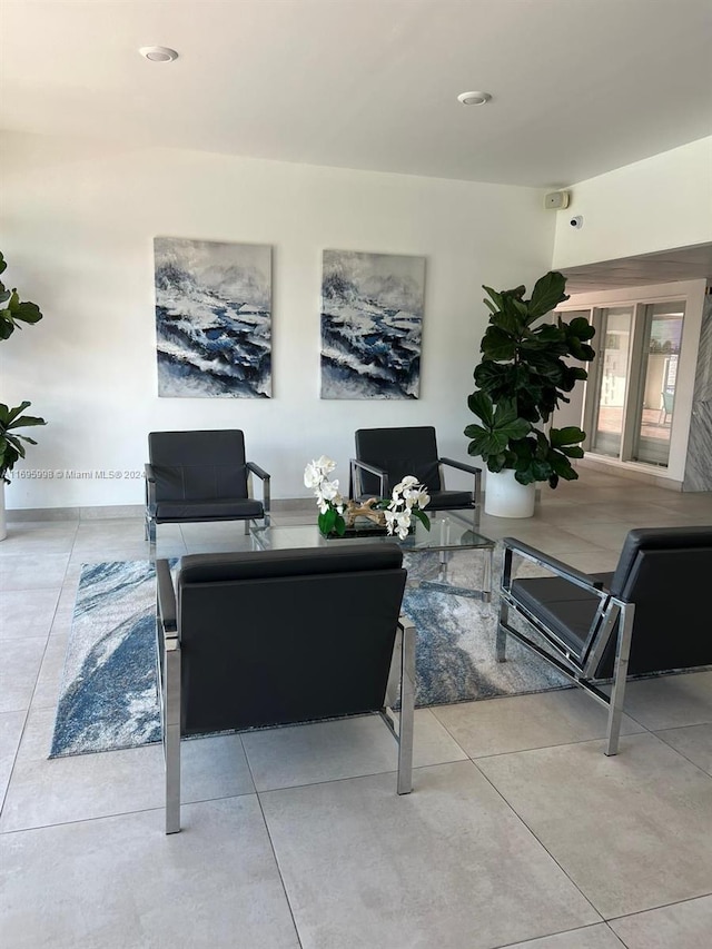 401 Golden Isles Dr Unit 303, Hallandale Beach, FL 33009 - living room with tile patterned floors