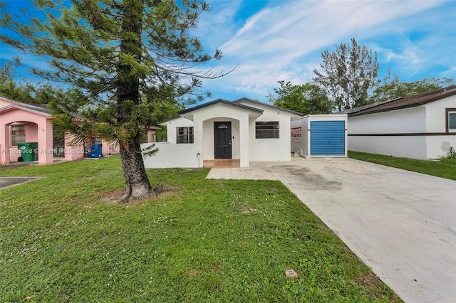 ranch-style house with a front yard