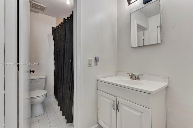 bathroom featuring tile patterned floors, vanity, toilet, and a shower with curtain