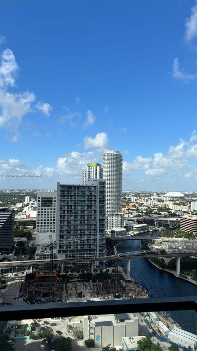 property's view of city featuring a water view