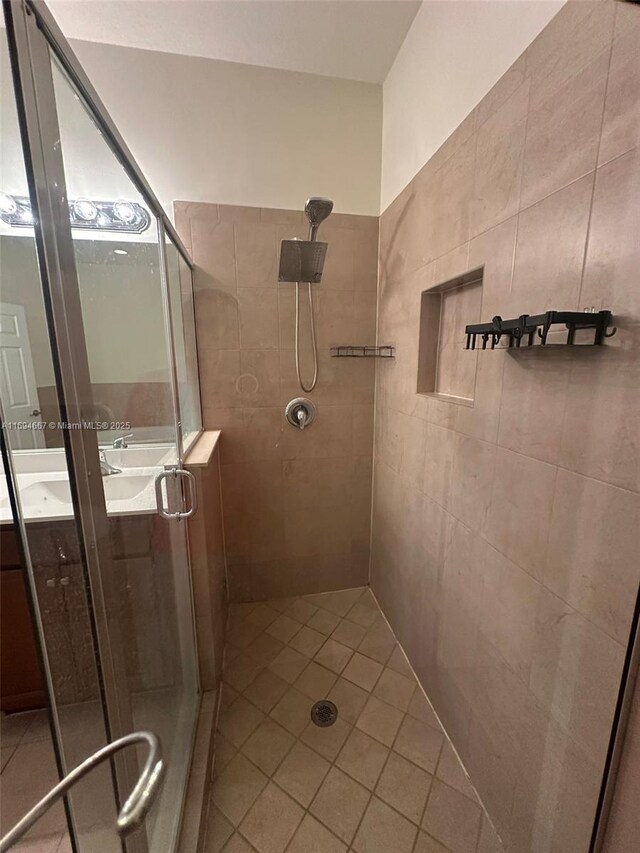 515 SE 35th Ave, Homestead, FL 33033 - bathroom featuring a shower stall, vanity, and tile patterned floors