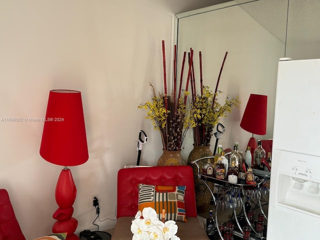 room details featuring white refrigerator with ice dispenser