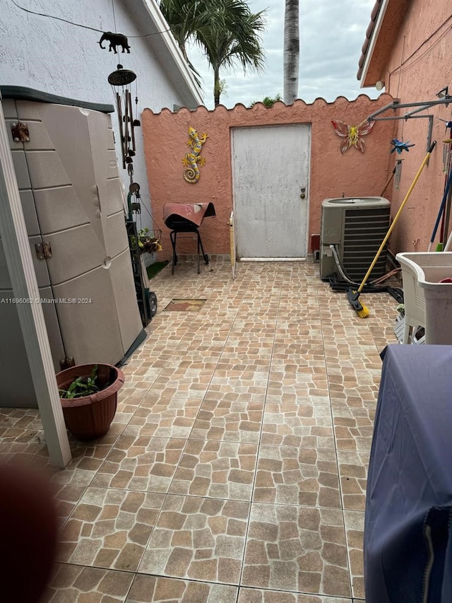 view of patio featuring central AC unit