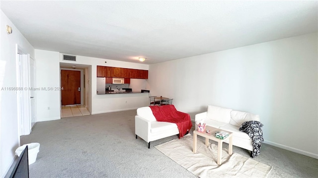 sitting room with light carpet