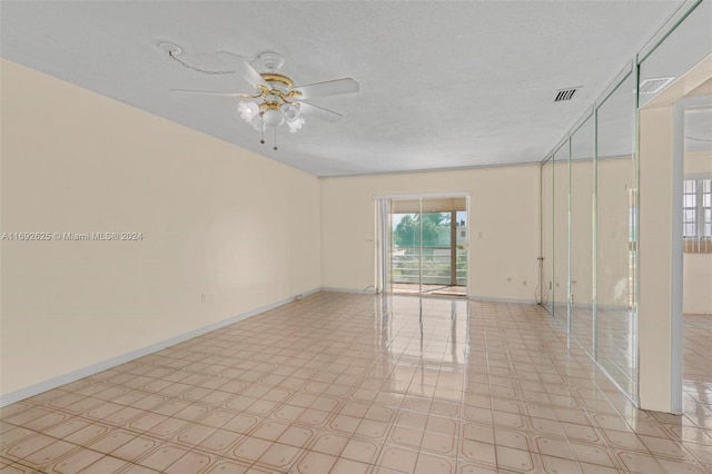 17000 NE 14th Ave Unit 301, North Miami Beach, FL 33162 - empty room with ceiling fan and baseboards