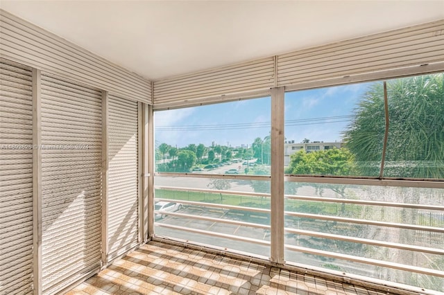 17000 NE 14th Ave Unit 301, North Miami Beach, FL 33162 - unfurnished sunroom featuring plenty of natural light