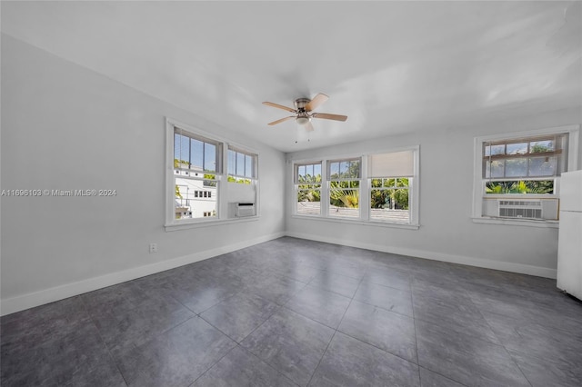 unfurnished room featuring ceiling fan