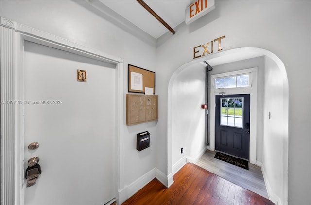 entrance foyer featuring hardwood / wood-style flooring