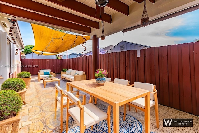 view of patio with an outdoor hangout area and ceiling fan