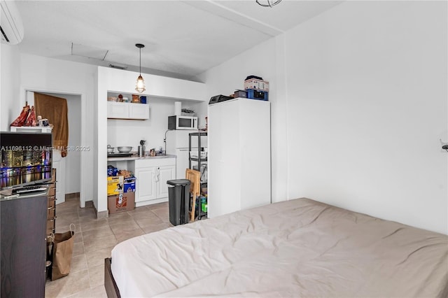 tiled bedroom featuring a wall mounted AC