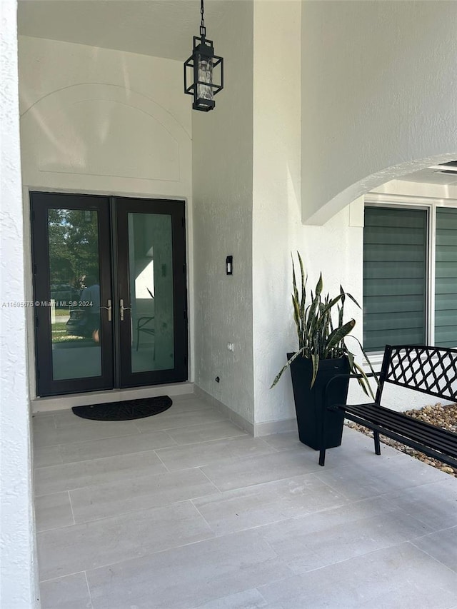 doorway to property with french doors