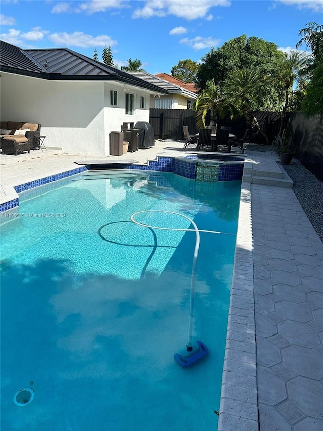 view of pool with a patio