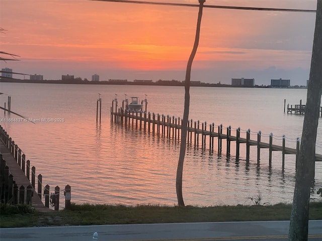 view of dock with a water view