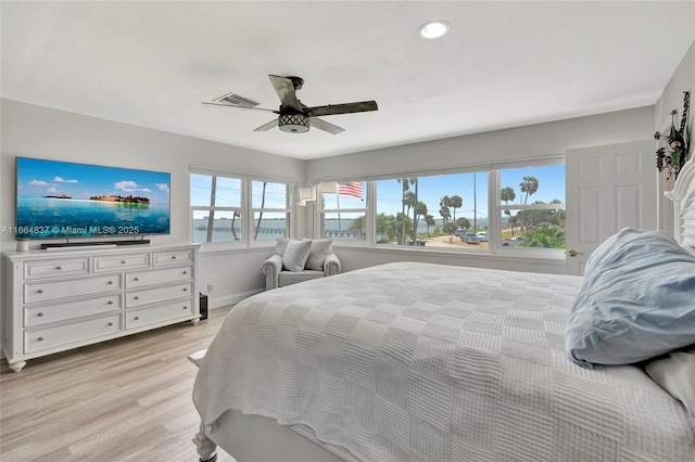 bedroom with visible vents, light wood-style flooring, recessed lighting, baseboards, and ceiling fan