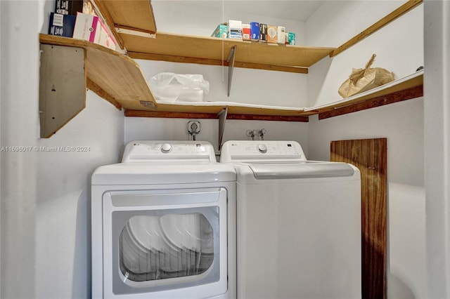 laundry area with washer and clothes dryer