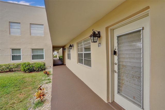 entrance to property with a yard