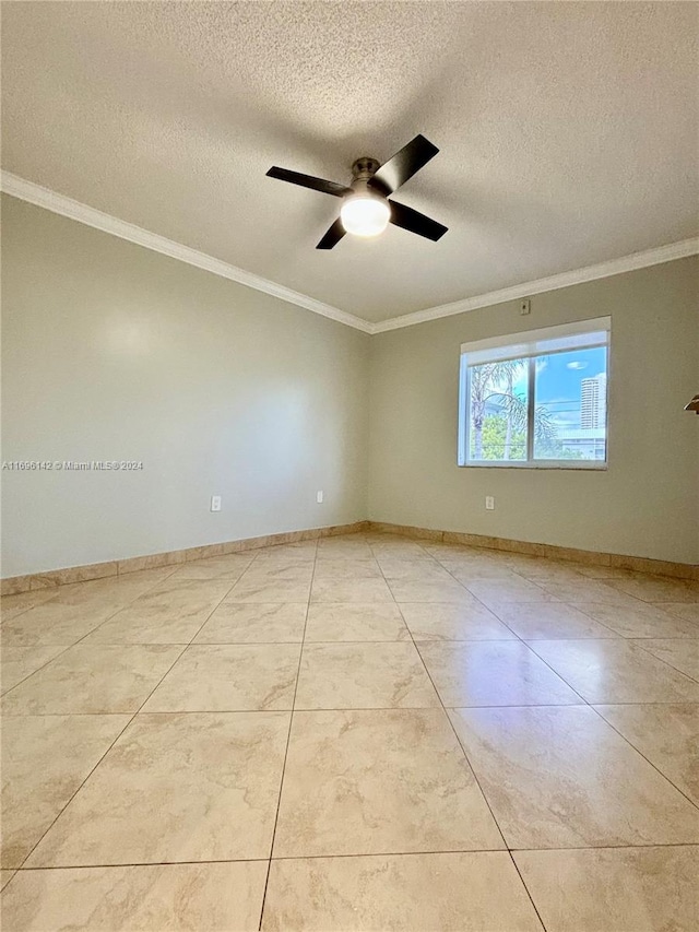 unfurnished room with a textured ceiling, ceiling fan, crown molding, and light tile patterned flooring